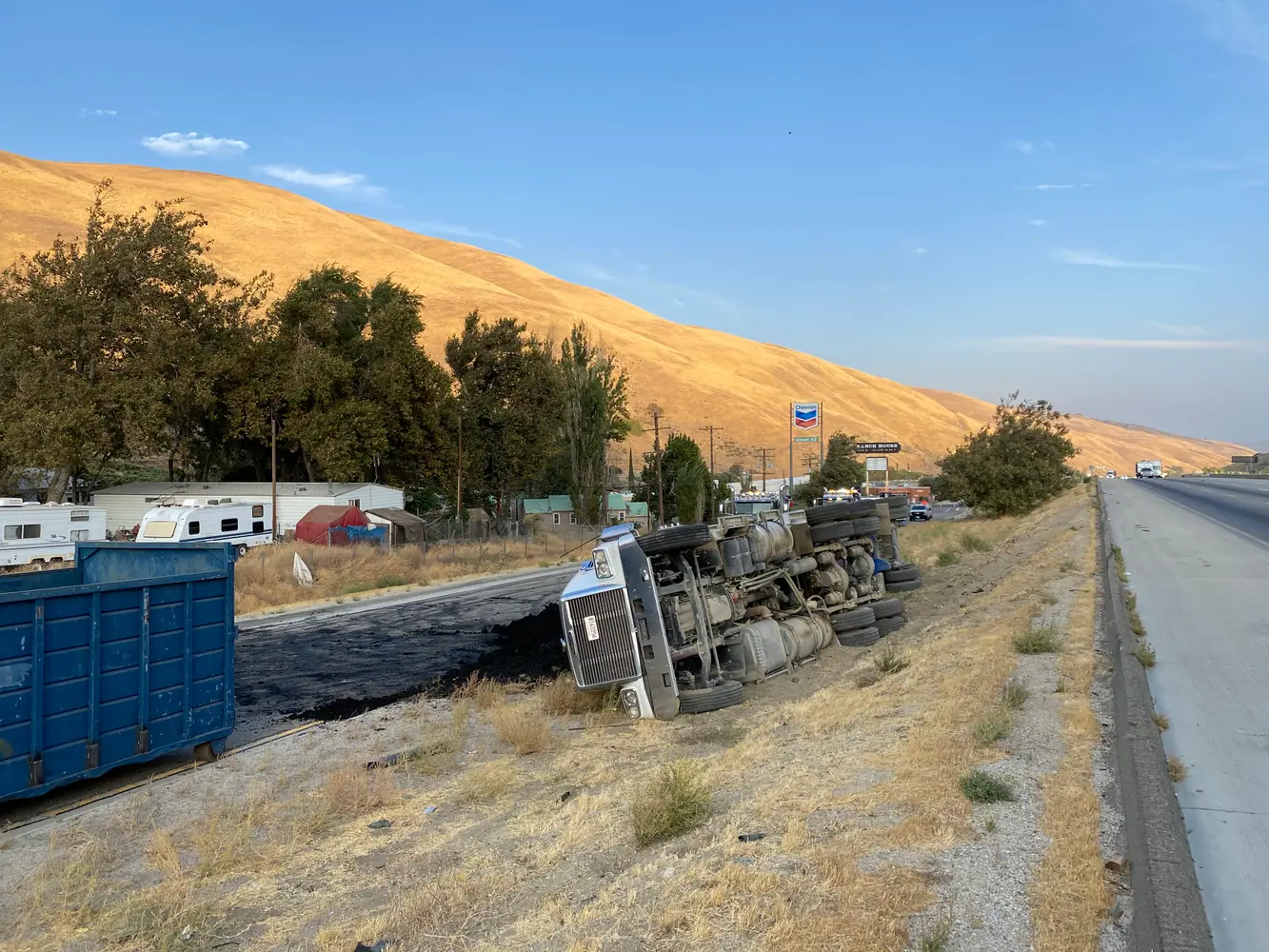 Chemical spill remediation around overturned truck near Lancaster CA