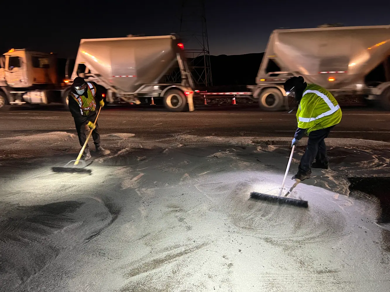 Oil spill cleanup with absorbent on a Lancaster CA roadway