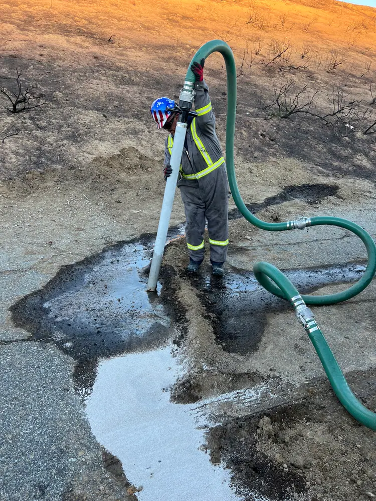 Roadway oil spill vacuum response near Lancaster CA