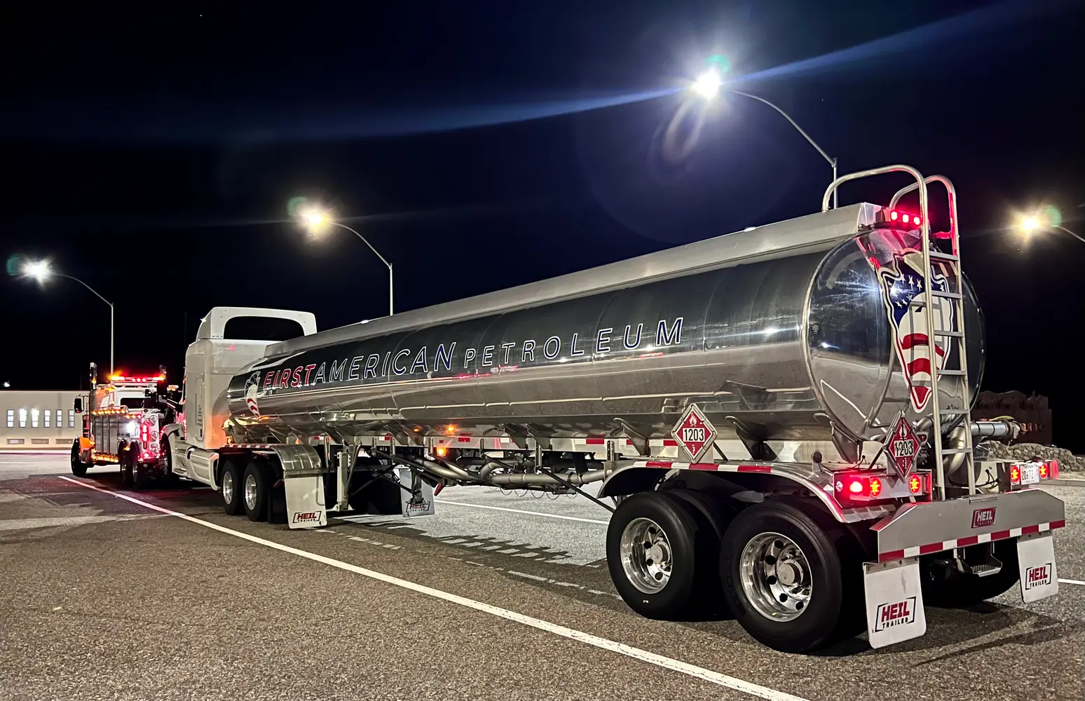 Tanker truck towing at night near Lancaster CA